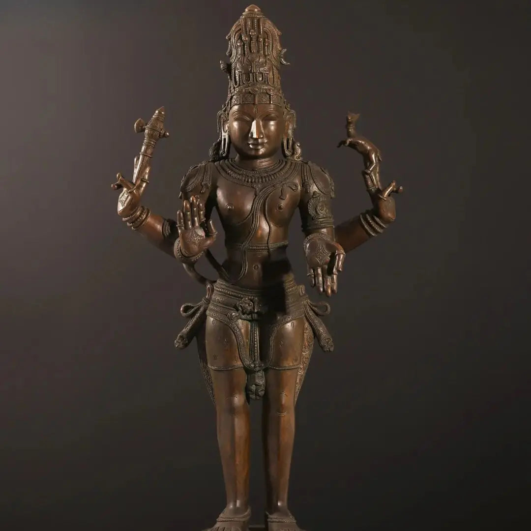 Molten bronze being poured into a clay mold using the ancient lost wax casting technique — Sacred Indian Craftsmanship | Moksha Craft